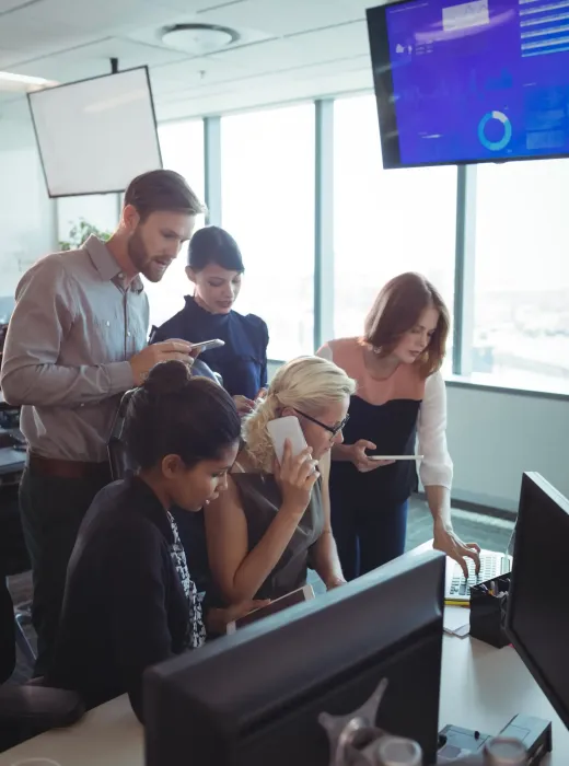 business-colleagues-working-together-while-using-t-2025-04-03-10-07-01-utc